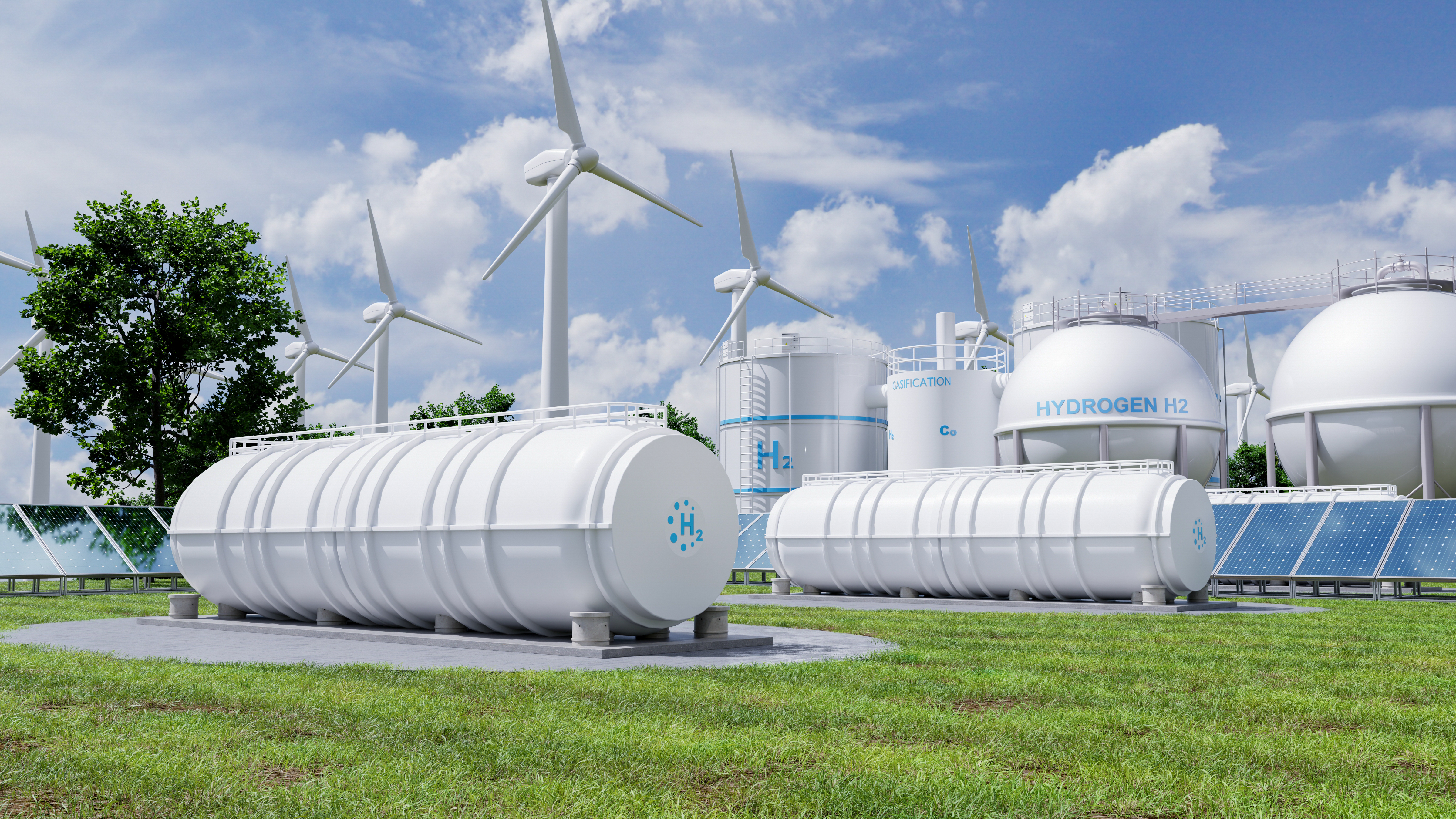 Static mixers supporting green hydrogen production alongside hydrogen storage tanks, wind turbines and solar panels. 